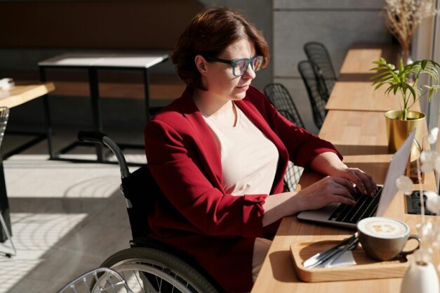 woman-wheelchair-working-laptop